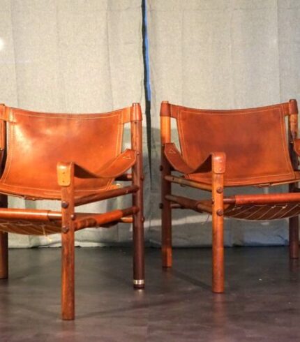 vintage-scandinavian-sirocco-safari-teak-lounge-chairs-in-cognac-leather-by-arne-norell-for-arne-norell-ab-1960s-set-of-2-1.jpg